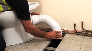 connect two toilets to one soil pipe