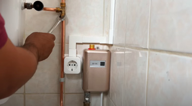 is toilet connected to water heater